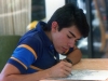 Alberto working on a drawing for his art class..