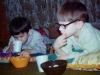 Although John went home to his family for most vacations and summer, he spent many weekends with Marian. Here is John with another classmate snacking on popcorn