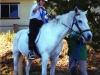 Paul trying to master some horseback riding skills