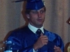 Rossie signing the National Anthem at his graduation.
