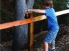 Sergei volunteering with a friend constructing a safety rail for his Eagle scout project